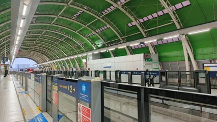 Bekasi, Indonesia &ndash; October 5, 2025: View of LRT Station Cikunir 1 tunnel construction arch steel and railway from platform.