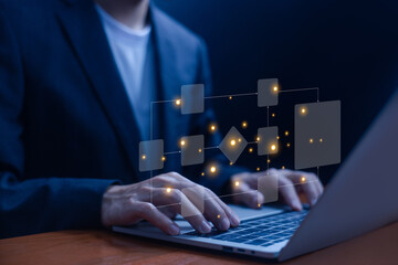 Businessman working on a laptop with a digital workflow diagram, representing business process automation, system management, data flow, and technology transformation concept. flowchart automation