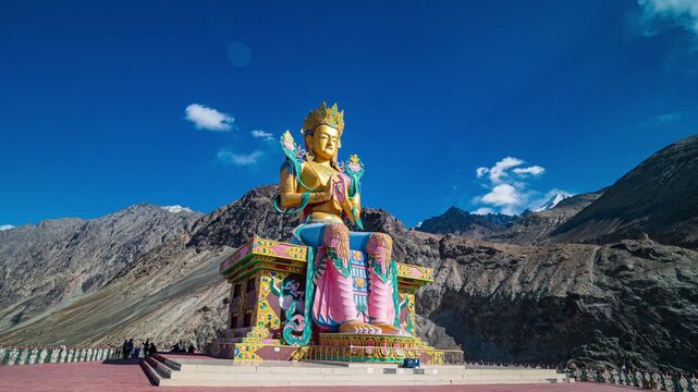 Timelapse A golden statue of Maitreya Buddha at Diskit Monastery also known as Diskit Gompa or Diskit Gompa is the oldest and largest Buddhist monastery in the Nubra Valley of Ladakh, northern India.