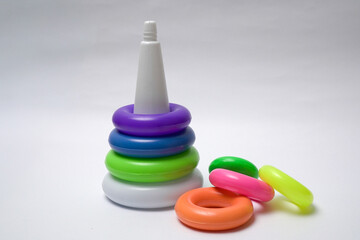 Colorful stacking rings toy partially assembled for kids learning