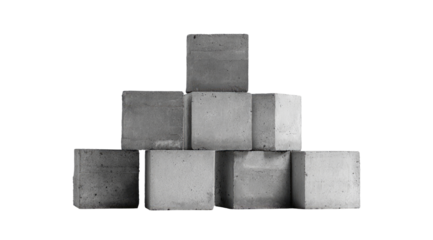 Gray concrete blocks stacked in a pyramid shape