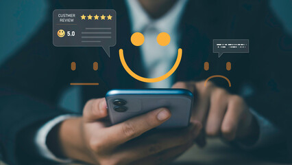 Customer satisfaction survey concept with smartphone and smiley face icons rating and review system, representing user feedback, client experience, online reputation, and digital marketing engagement.