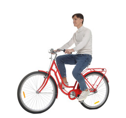 Naklejka premium Handsome man riding red bicycle on white background