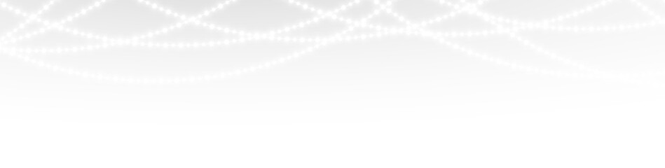 Festive holiday Christmas string with glowing bulbs, garland decoration and illuminated light effect, ideal background for greeting cards, banners, and seasonal celebration designs.