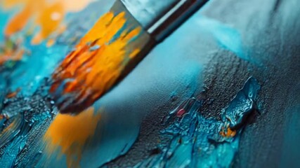 Close up of a paintbrush with vibrant colors on a textured surface. - Powered by Adobe