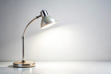 Illuminate the Moment: A sleek, modern desk lamp casting a warm, inviting glow, perfectly positioned to light up any creative endeavor.