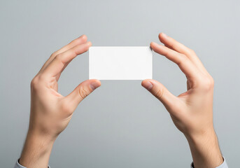 Two Hands Presenting a Blank Horizontal Business Card Mockup.