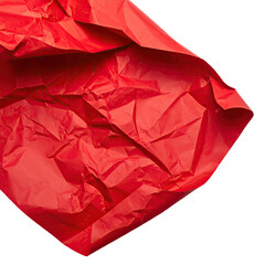 Close-up of a crumpled vibrant red paper, showcasing folds and texture