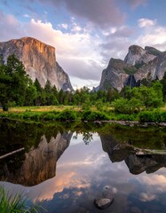 Majestic mountain range reflected in calm water