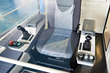 Seat and joysticks for construction machinery © Sergey Ryzhov
