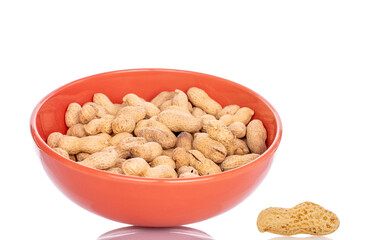 Unshelled peanuts isolated on white background, macro.