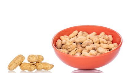 Unshelled peanuts isolated on white background, macro.