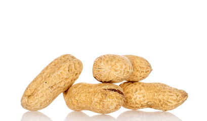 Unshelled peanuts isolated on white background, macro.
