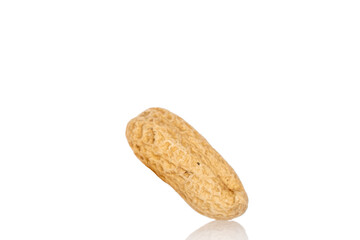 Unshelled peanuts isolated on white background, macro.