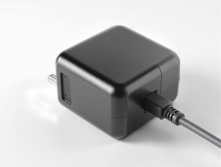 Black USB-C Charger and Cable on White Background