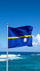 National flag of a tropical island nation, waving proudly over ocean waves