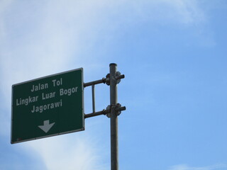 street sign with blue sky