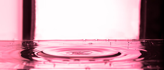 332.Pink Ripple Effect from Droplet Impact on Water