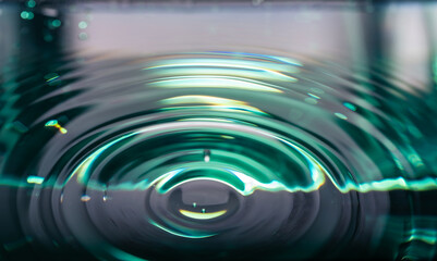 380.Circular Ripples On Liquid Surface With Blue-Green Light