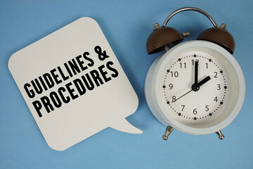 Guidelines And Procedures text with alarm clock on blue background