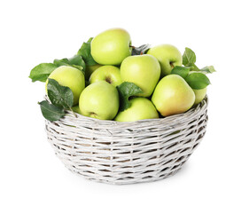Ripe green apples with fresh leaves in wicker basket isolated on white