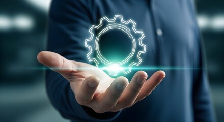 Closeup of a persons hand holding a glowing digital gear symbolizing technology, innovation, and engineering concepts in a modern business setting