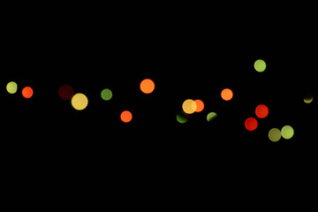 Abstract background with multiple blurred light circles forming a soft bokeh effect.