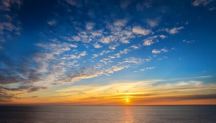 Obraz premium Sunset Sky Background Over The Coast Of Hudson Bay Blue Sky With Hints Of Yellow And Orange And White Wispy Clouds