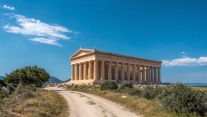Fototapeta premium Ancient Greek Temple Surrounded by Nature and Sky