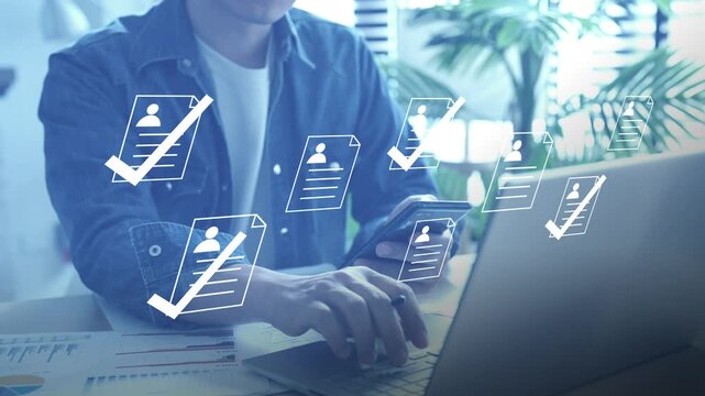 Human resources manager using recruitment technology and digital tools for candidate selection and hiring approval.