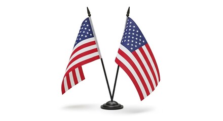 Obraz premium Two small american flags on stands for display isolated on white background
