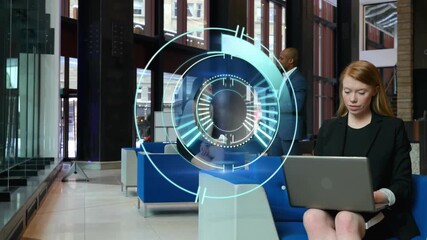 Seated typing laptop initiating hologram booting with lighting segments for business collaboration - Powered by Adobe