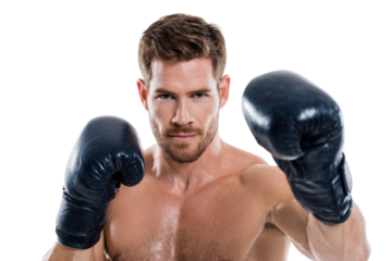 Male boxer wearing black gloves punching forward isolated on background