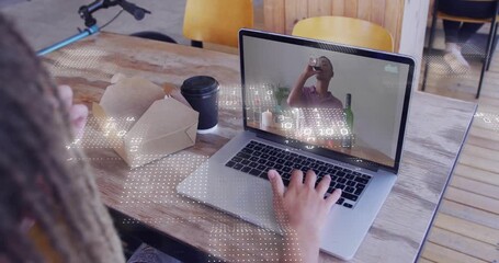 Seated man placing sandwich opening laptop starting business call data overlays intensifying hands - Powered by Adobe