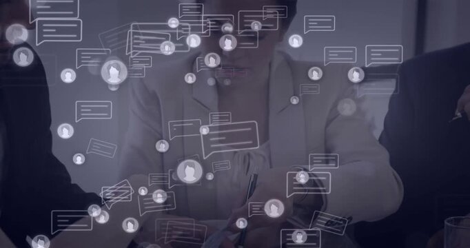 Consultant signing contract in business meeting, as chat bubbles appear highlighting collaboration