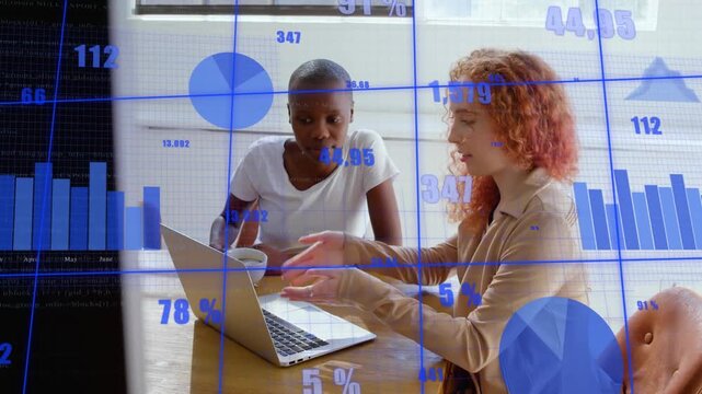 Red-haired colleague gesturing to laptop starting tech review with animated chart highlighting data