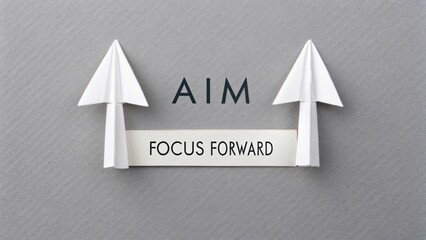 Creative Concept of Aim and Focus with Paper Arrows on Gray Background