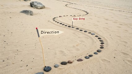Creative Pathway of Stones with Direction Flags on Sandy Beach