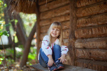 Charming Girl Enjoys Autumn Outdoors With Laughter During Halloween Festivities in October's Warm Sunlight