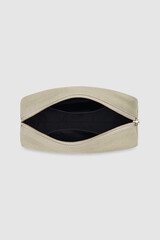 Beige canvas cosmetic bag open with zipper top view on grey
