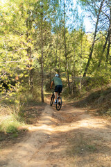 Naklejka premium young man riding a bike