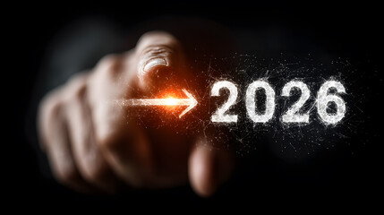 Hand Pointing Forward to Year 2026 with an Arrow Symbolizing Progress and a Future Goal