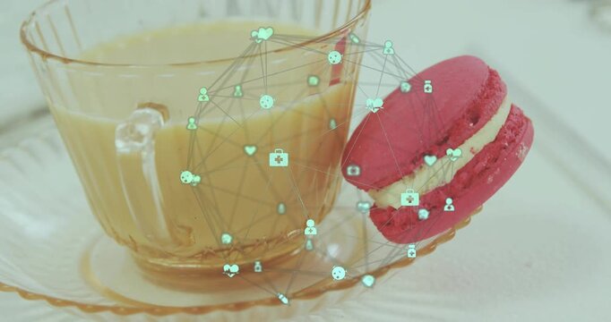 Starting third frame, green network forming around coffee cup and macaron, visualizing data flow