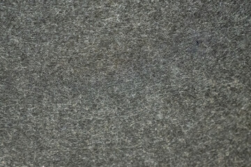 A close up of a grey surface with a lot of texture