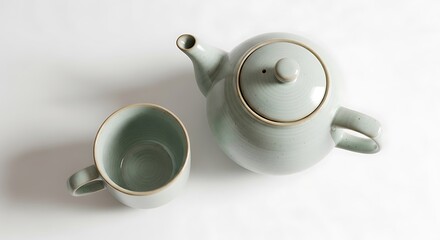 Tea Time A Serene Still Life of Teapot and Cup on a White Background