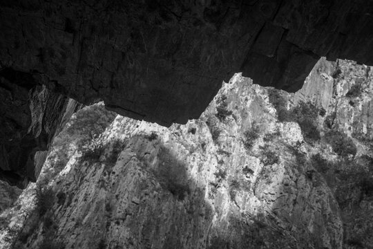 Abstract  Upper and Lower Jaw of the Beast. State of Mind, Balance and Contrast. Natural Cliff background. Monochrome Hues.