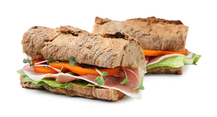 Tasty ciabatta sandwiches with prosciutto isolated on white