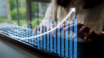 A person typing on a keyboard, accompanied by a digital growth graph and an upward arrow, symbolizes business success and analytics in a modern office setting. Copula