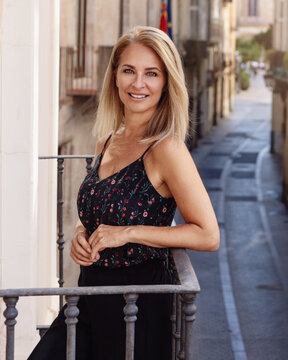 Woman on a balcony in Spain