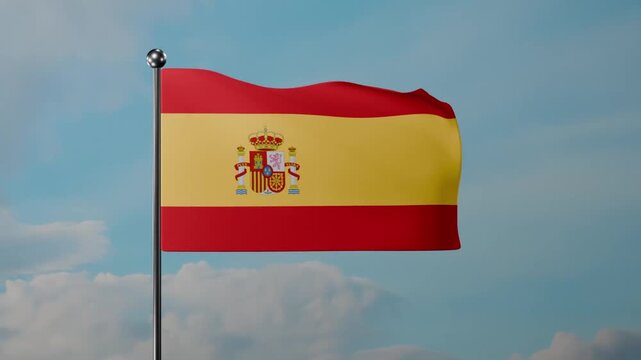 A waving Spanish flag on a tall pole against a clear blue sky. Red and yellow stripes with the coat of arms symbolize unity, heritage, and national pride.
